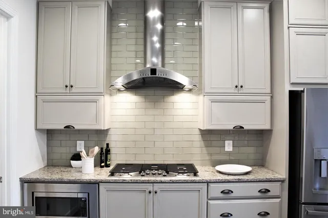 a view of water heater with wooden floor