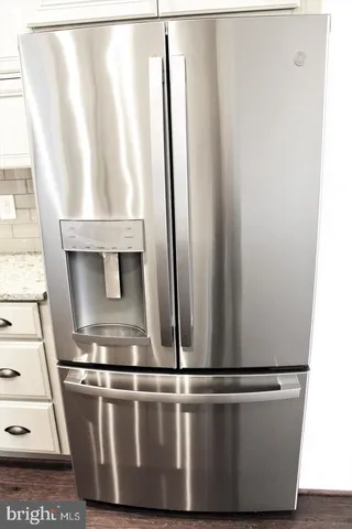 a view of kitchen and microwave