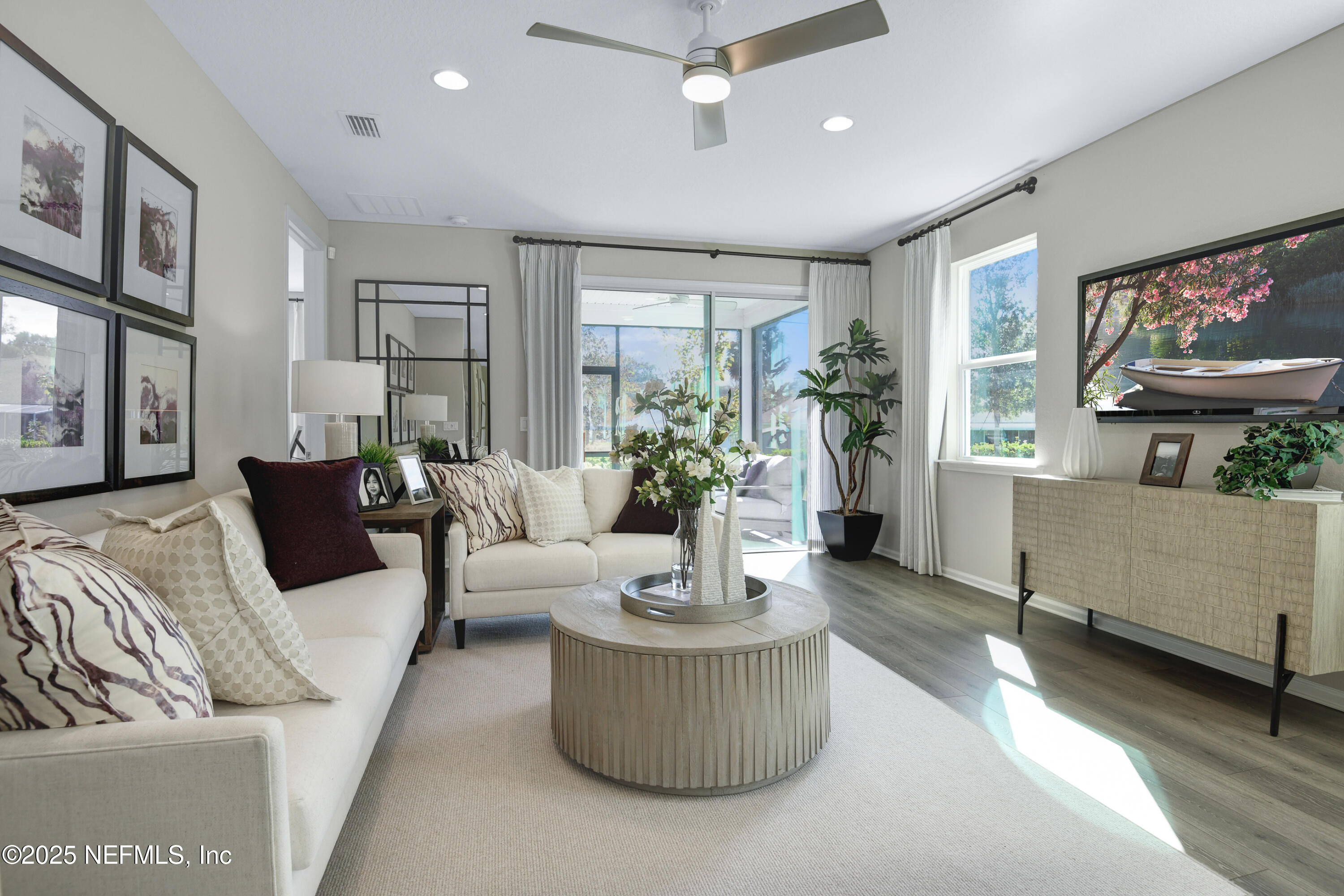 513 White Rabbit Run St. Augustine, FL 32092 - Photo 8 of 35 a living room with furniture and a large window