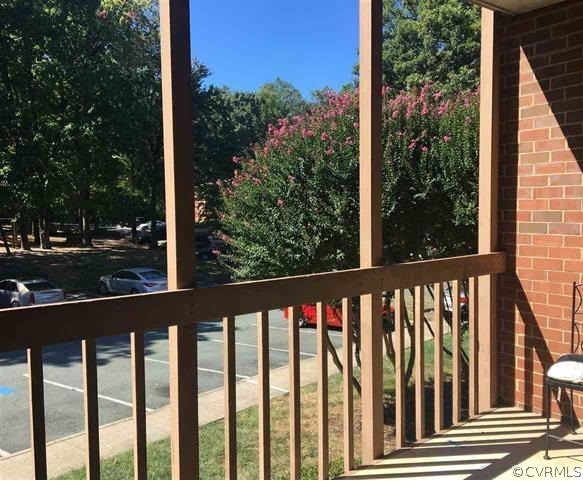 123 Turtle Creek Road, Unit 5 Charlottesville, VA 22901 - Photo 1 of 18 a view of a street view from a balcony