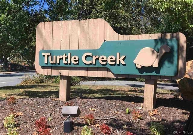 123 Turtle Creek Road, Unit 5 Charlottesville, VA 22901 - Photo 18 of 18 a sign on the side of the road