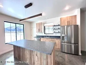 $1,040,000 | 115 Spike Loop, Etna, WY 83118