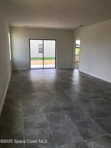 en empty room with windows