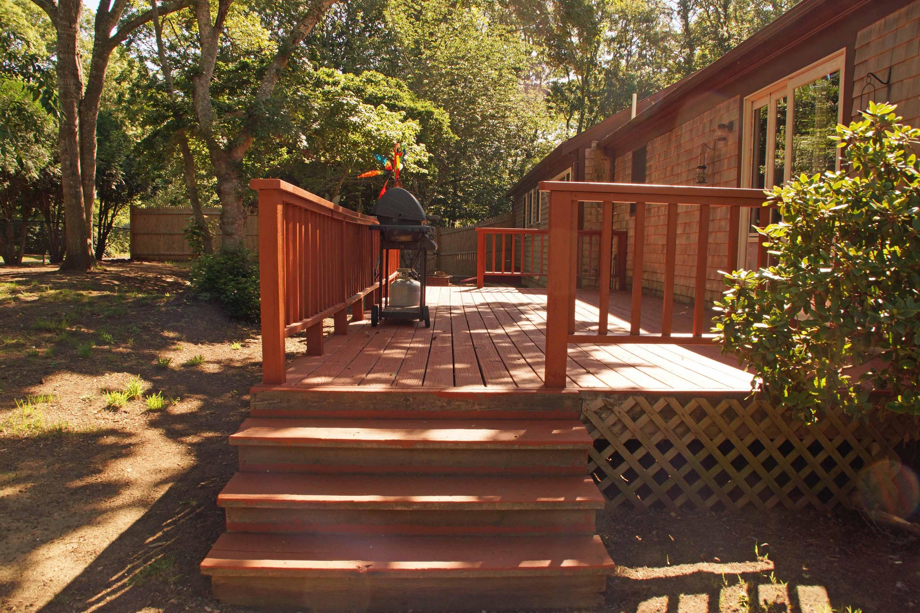 111 Azalea Drive Harwich, MA 02645 - Photo 17 of 26 a view of backyard with deck