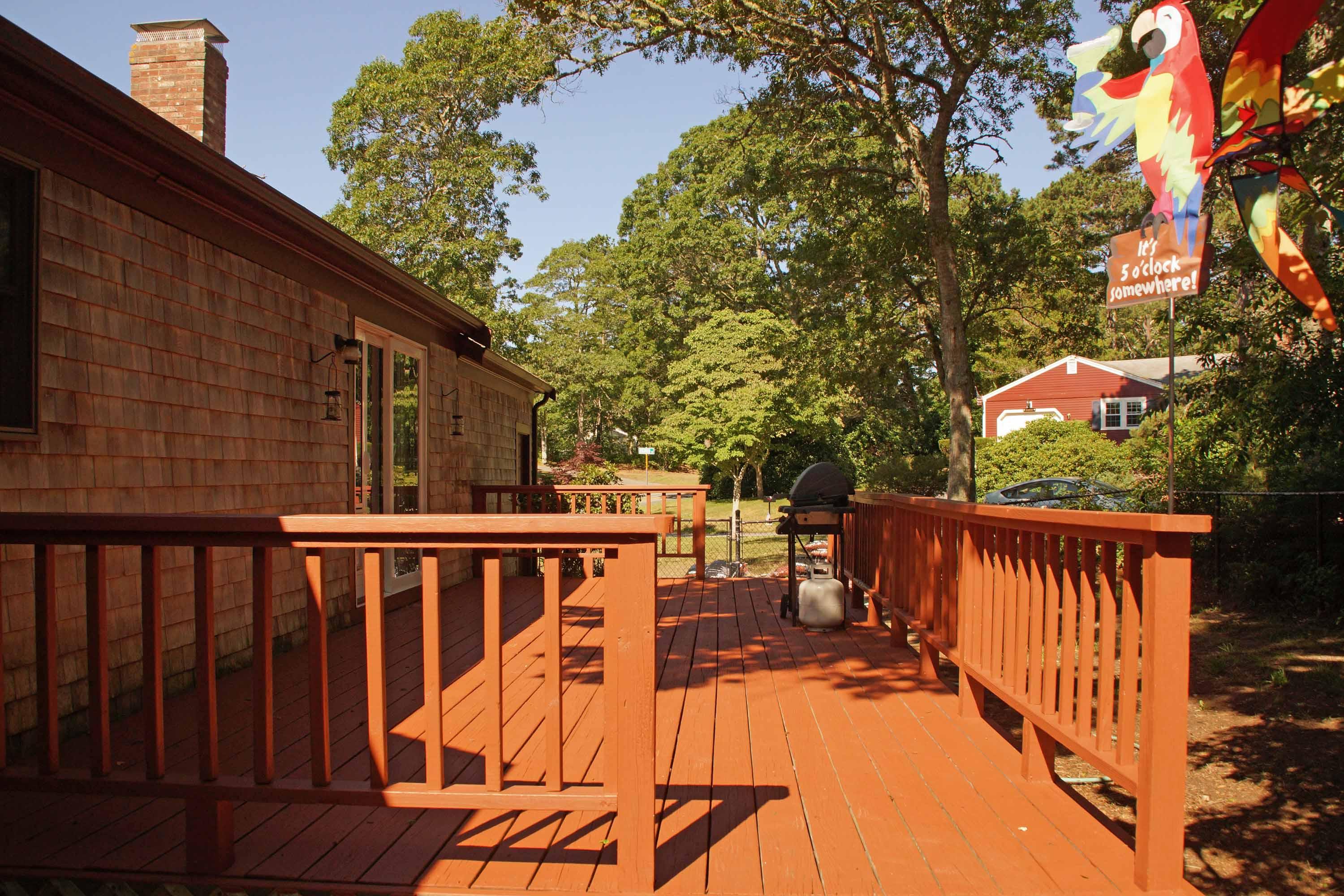 111 Azalea Drive Harwich, MA 02645 - Photo 18 of 26 a view of deck with chairs and wooden fence