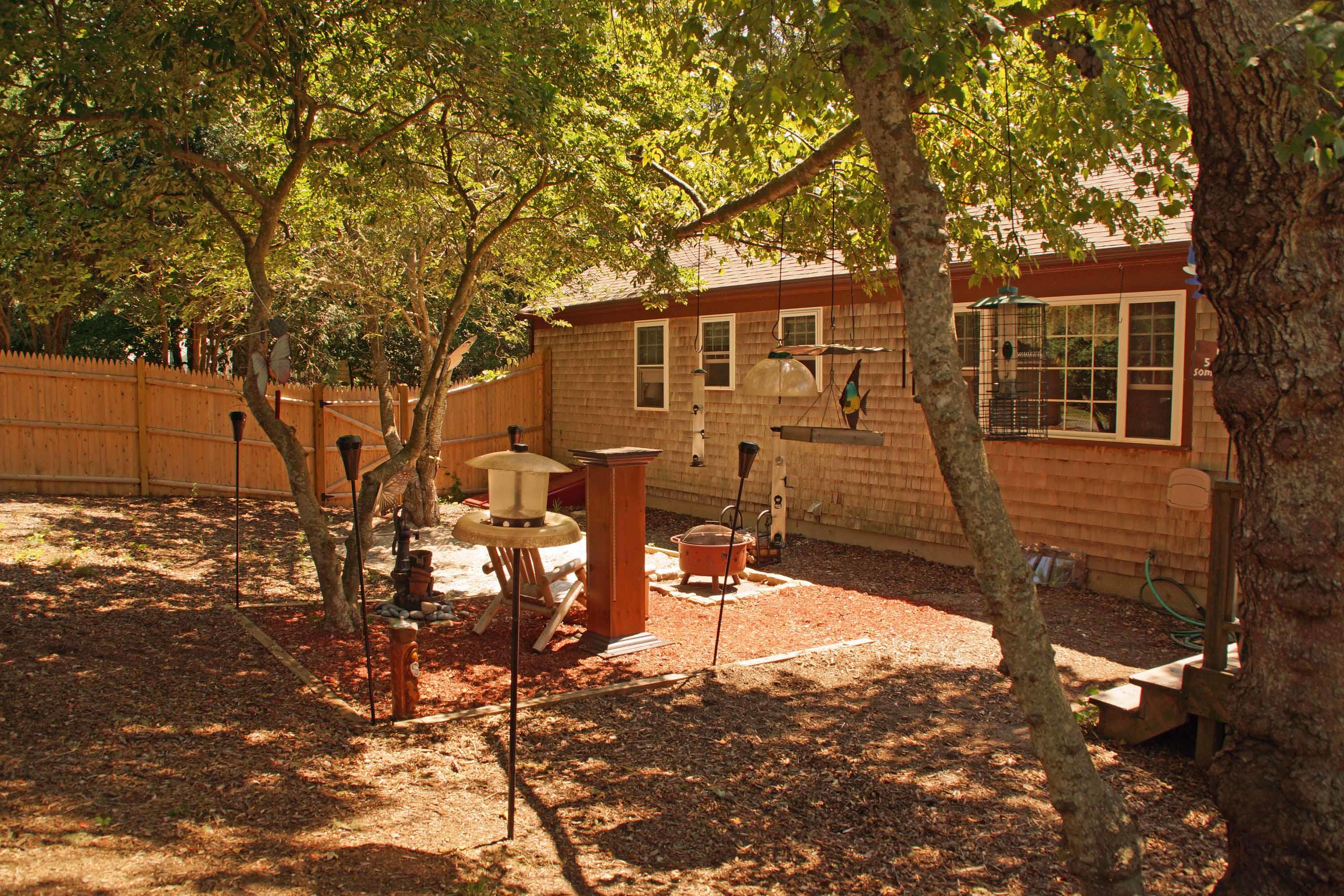 111 Azalea Drive Harwich, MA 02645 - Photo 19 of 26 a view of a house with a tree