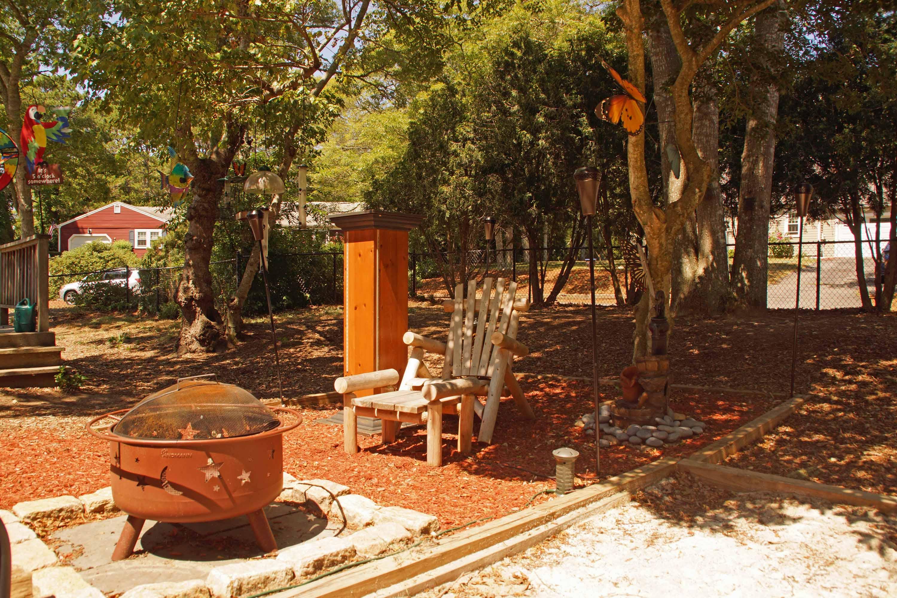 111 Azalea Drive Harwich, MA 02645 - Photo 21 of 26 a view of a house with a yard