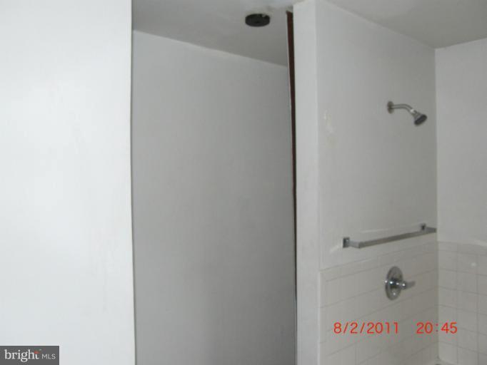 402-11 East 11th Avenue Ranson, WV 25438 - Photo 8 of 19 a close up of a shower