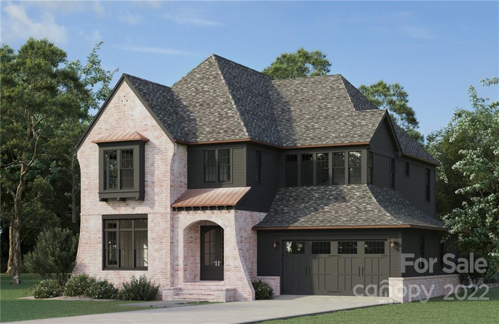 609 Lochridge Road Charlotte, NC 28209 - Photo 1 of 14 a front view of a house with garden