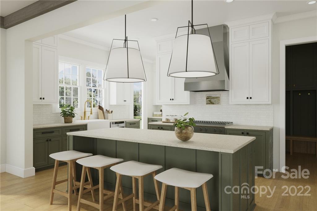 609 Lochridge Road Charlotte, NC 28209 - Photo 11 of 14 a dining table with chairs and kitchen view