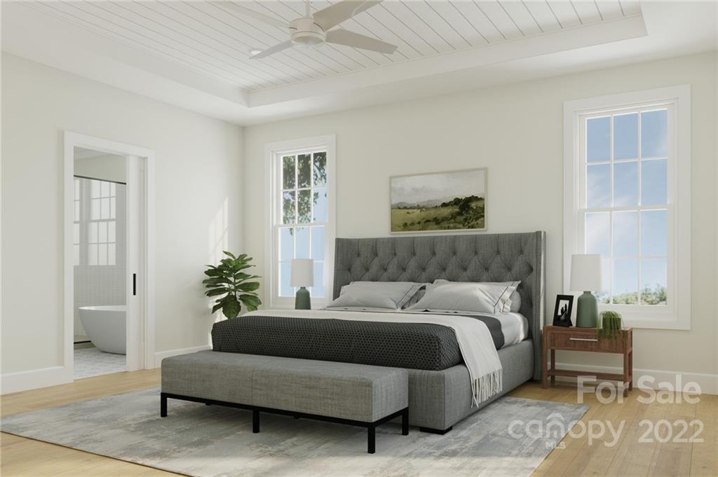 609 Lochridge Road Charlotte, NC 28209 - Photo 13 of 14 a bedroom with a bed and a couch