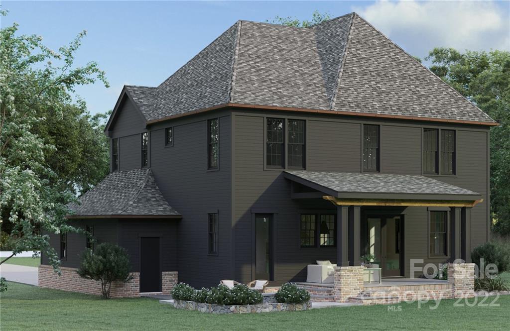 609 Lochridge Road Charlotte, NC 28209 - Photo 4 of 14 a front view of a house with garden