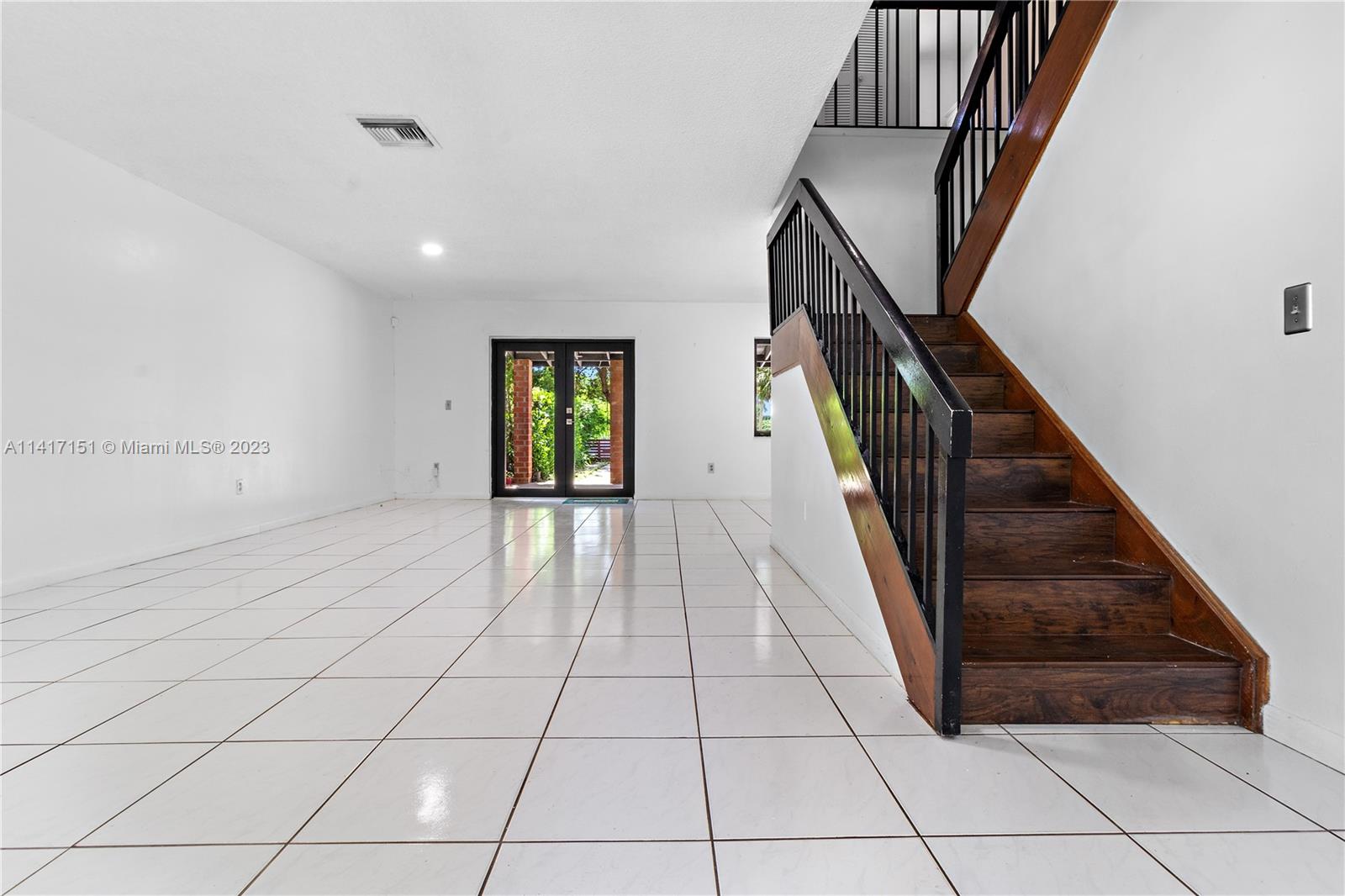 9435 Southwest 151st Avenue Miami, FL 33196 - Photo 1 of 35 a view of entryway with workspace