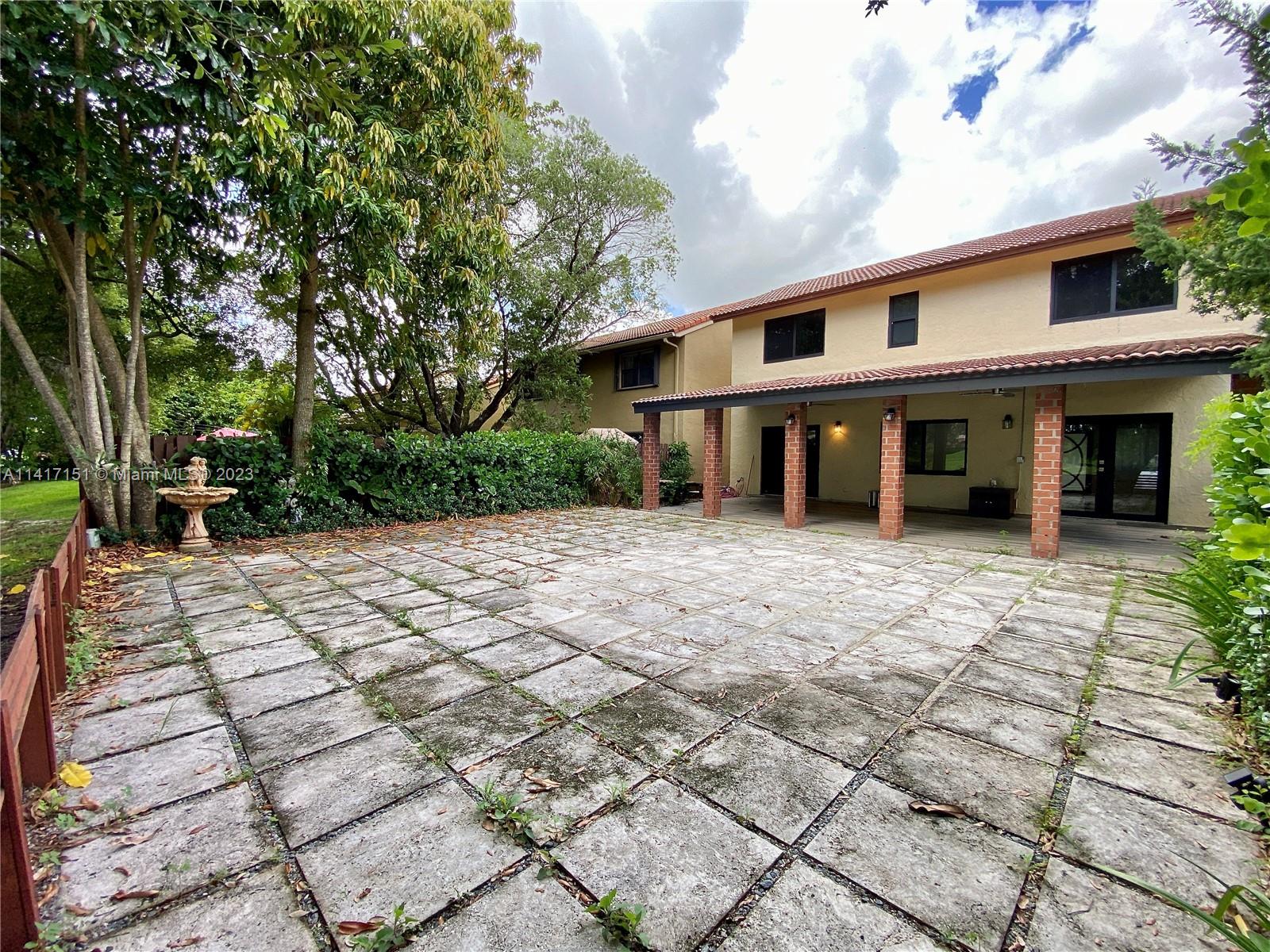 9435 Southwest 151st Avenue Miami, FL 33196 - Photo 26 of 35 a view of house with yard and sitting area