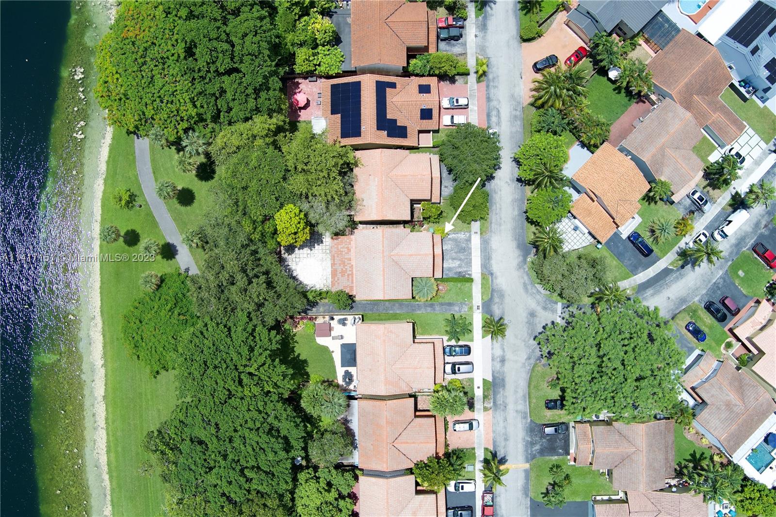 9435 Southwest 151st Avenue Miami, FL 33196 - Photo 35 of 35 an aerial view of residential houses with plants and swimming pool