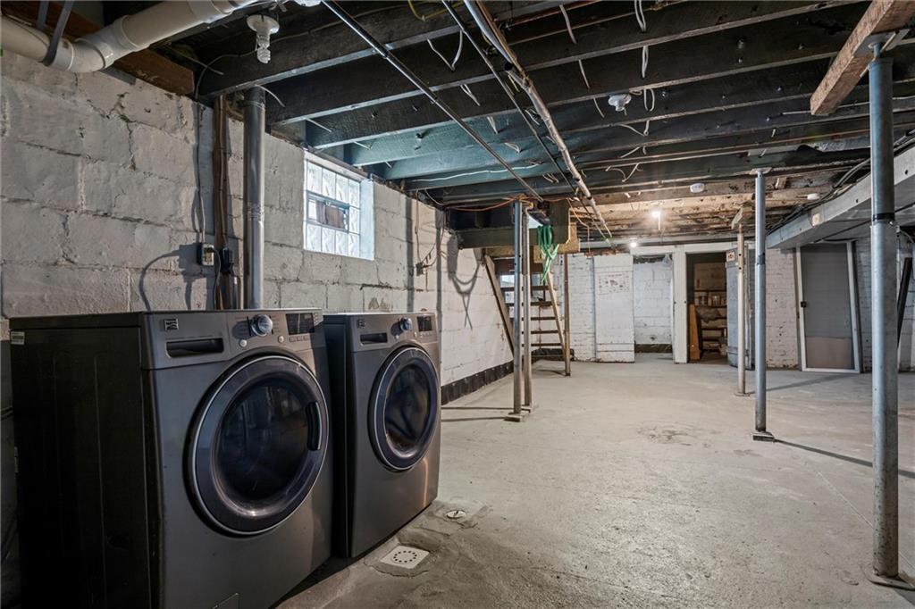 325 Walnut Street Vandergrift, PA 15690 - Photo 22 of 29 a view of a storage room with washer and dryer