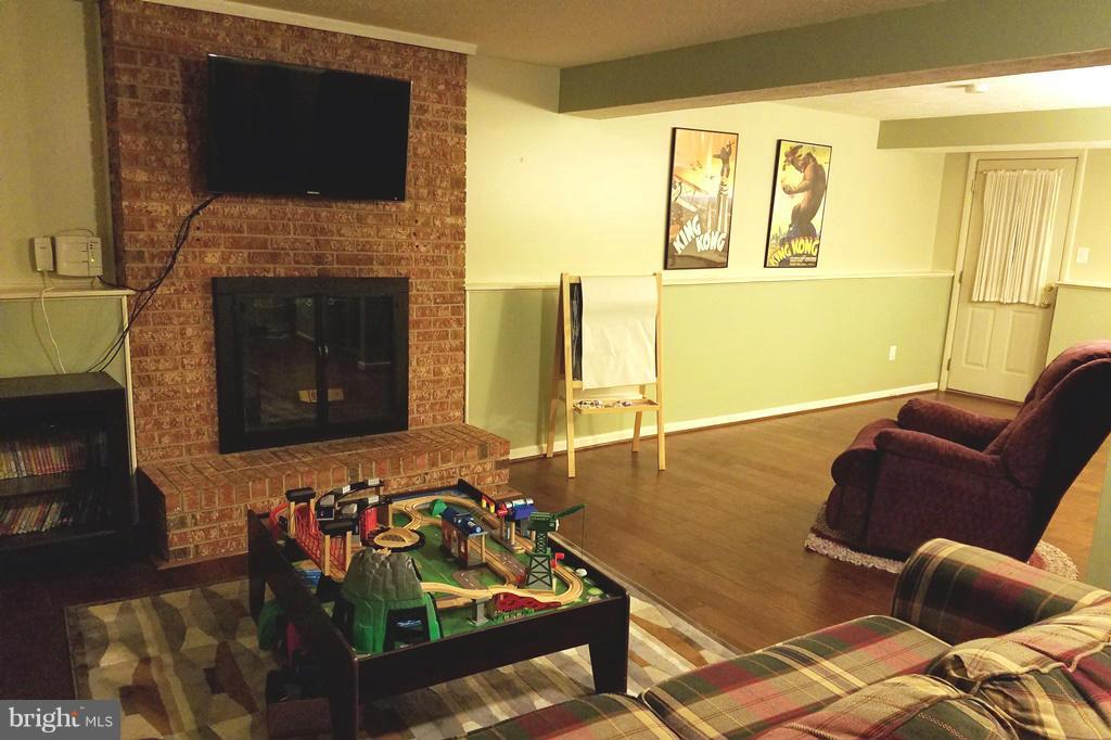 10110 Trinity Lane Manassas, VA 20110 - Photo 28 of 30 Family Room with brick fireplace