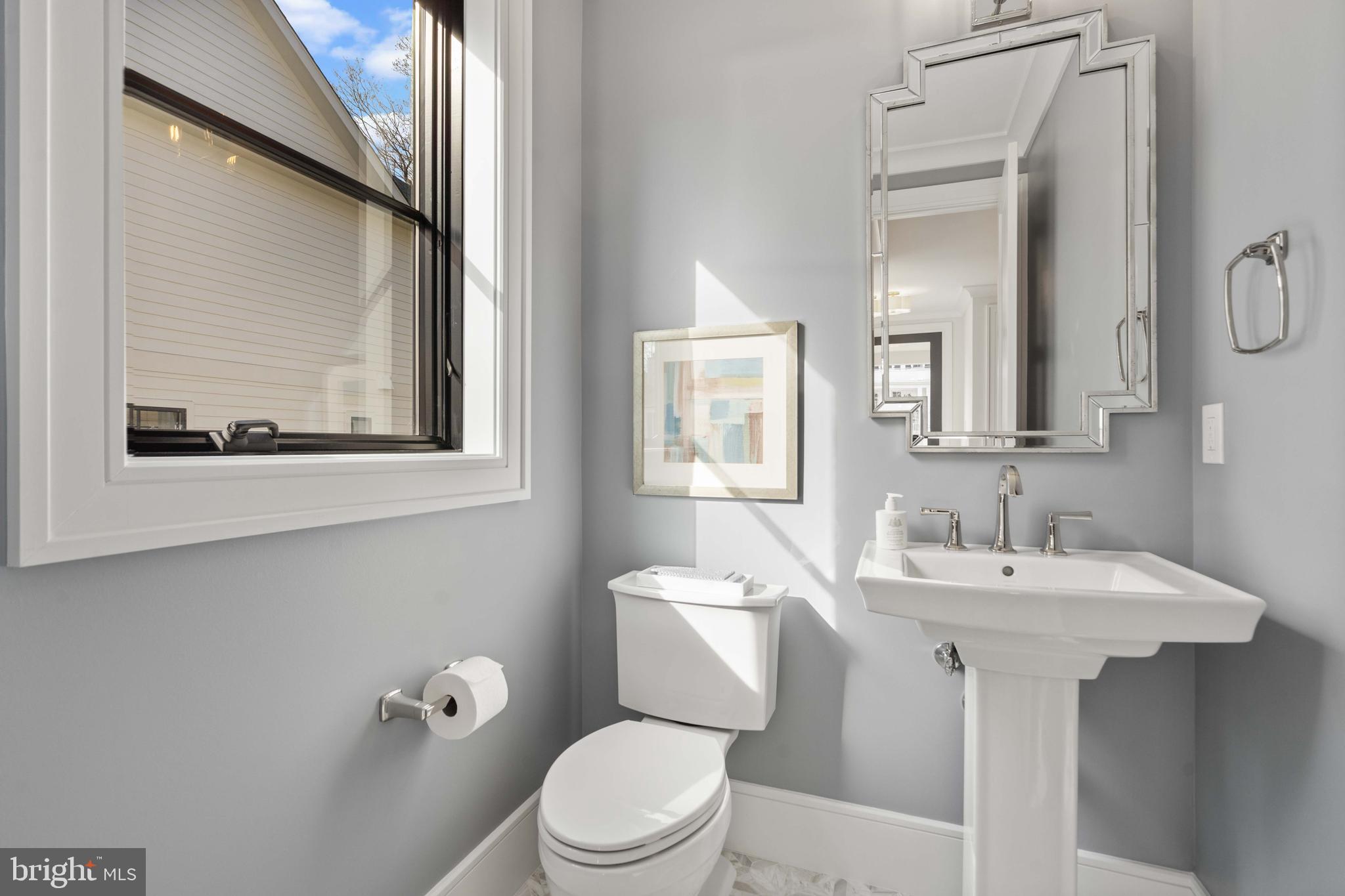 4827 33rd Road North Arlington, VA 22207 - Photo 24 of 59 main level powder room off foyer with coat closet