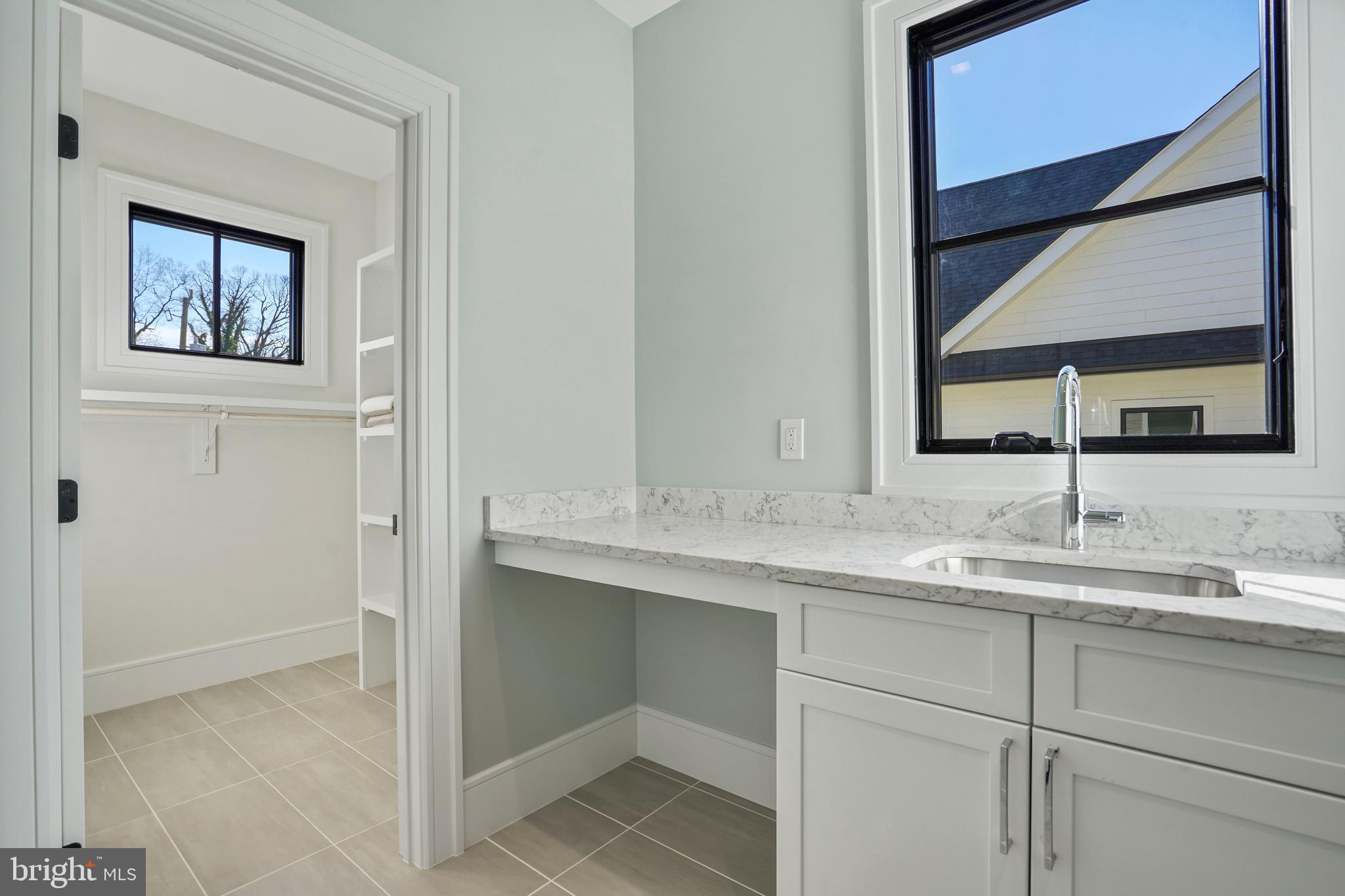 4827 33rd Road North Arlington, VA 22207 - Photo 44 of 59 Laundry sink and hamper space