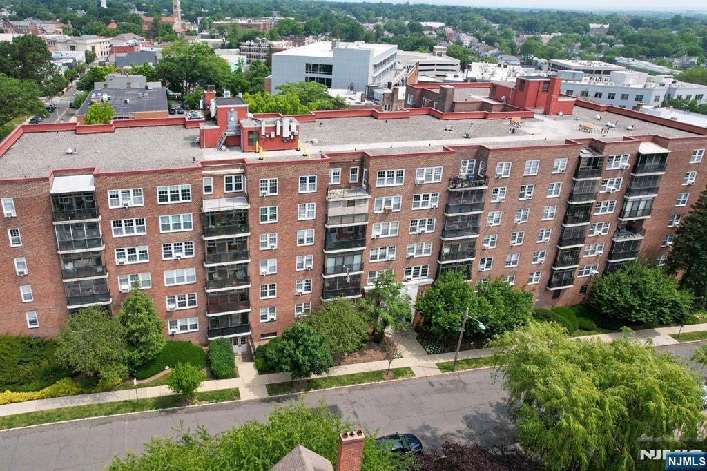 5 Roosevelt Place, Unit 2B Montclair, NJ 07042 - Photo 11 of 20 a large building with a clock tower in front of it