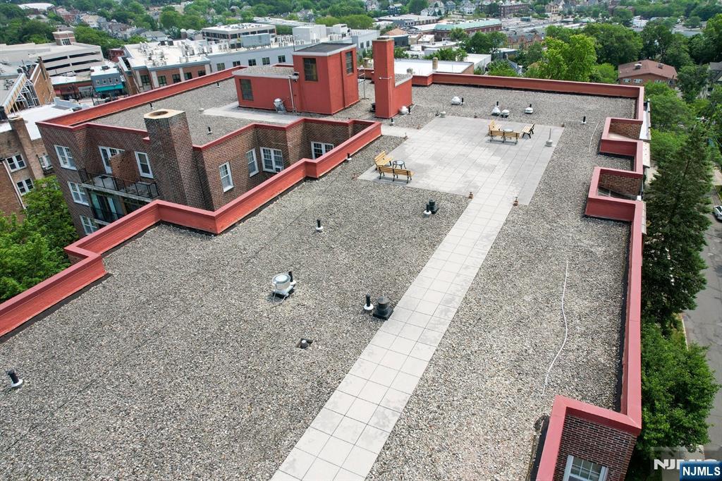 5 Roosevelt Place, Unit 2B Montclair, NJ 07042 - Photo 15 of 20 an aerial view of residential houses with outdoor space