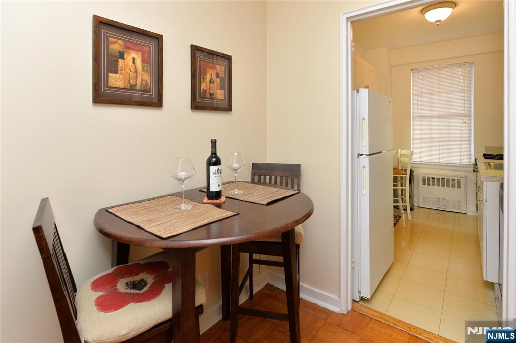 5 Roosevelt Place, Unit 2B Montclair, NJ 07042 - Photo 2 of 20 a view of a dining room with furniture and a window
