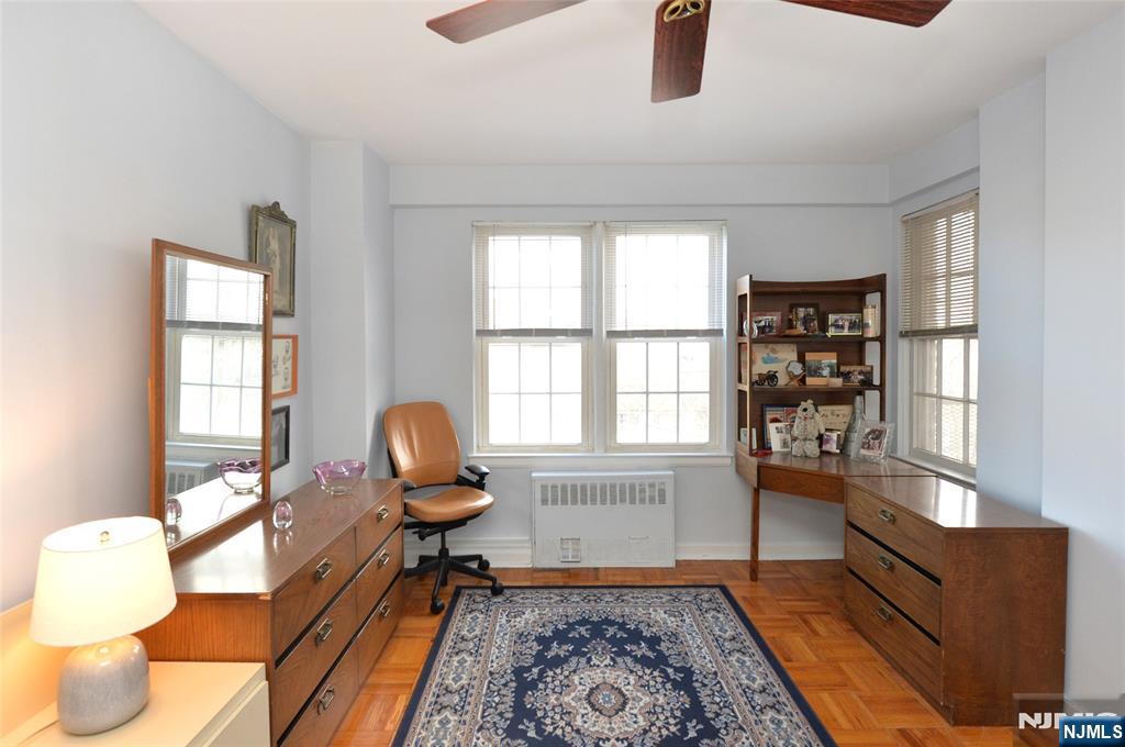 5 Roosevelt Place, Unit 2B Montclair, NJ 07042 - Photo 8 of 20 a living room with furniture