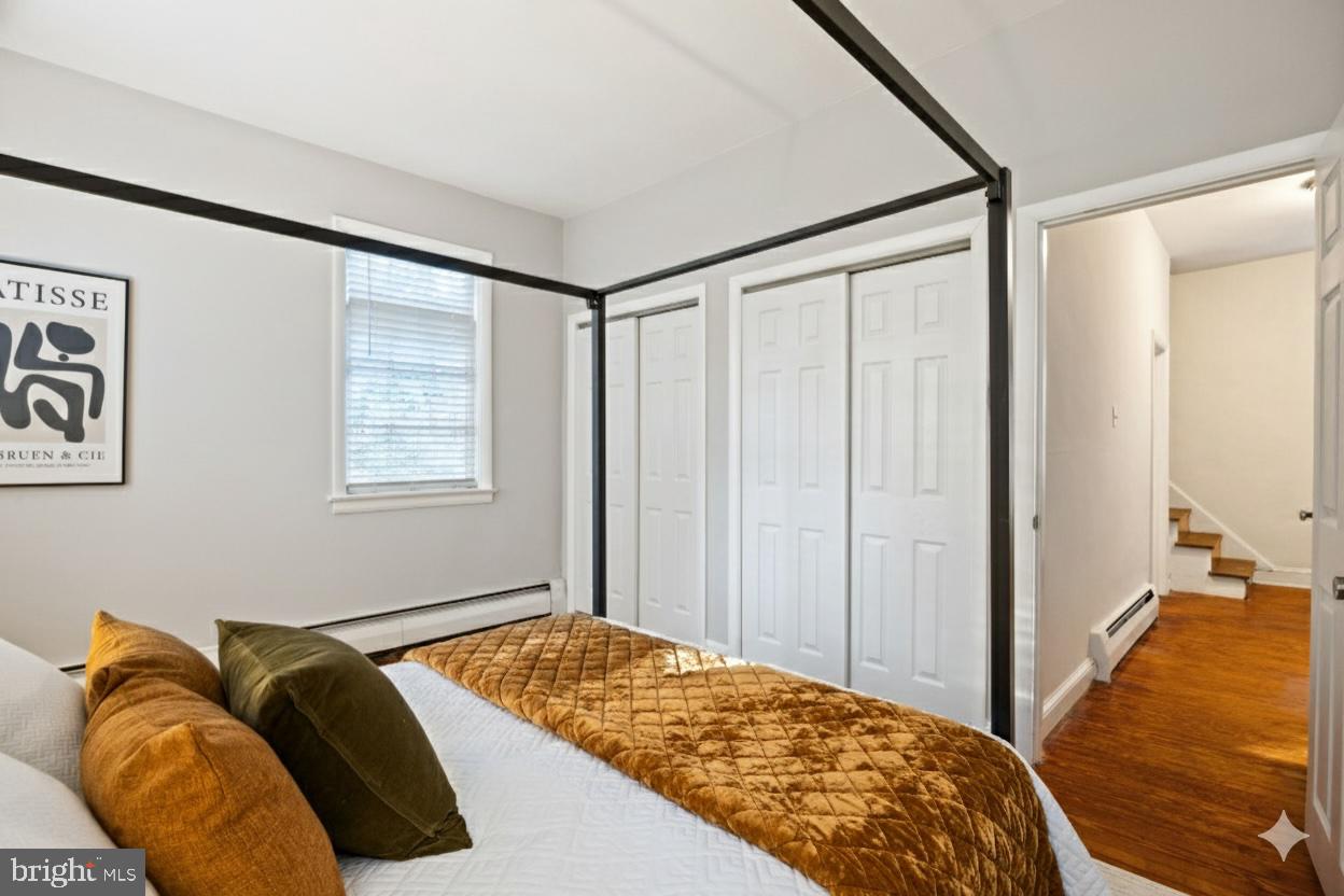 1238 Waverly Street Philadelphia, PA 19147 - Photo 15 of 24 a bedroom with a bed and a window