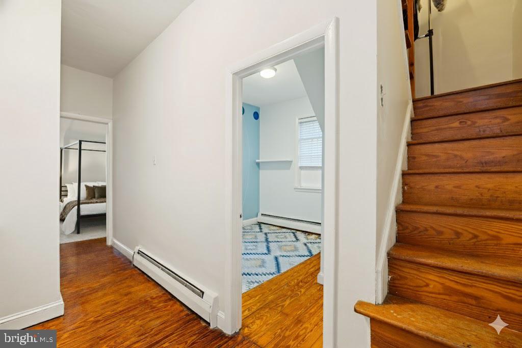 1238 Waverly Street Philadelphia, PA 19147 - Photo 20 of 24 a view of a hallway with wooden floor and entryway