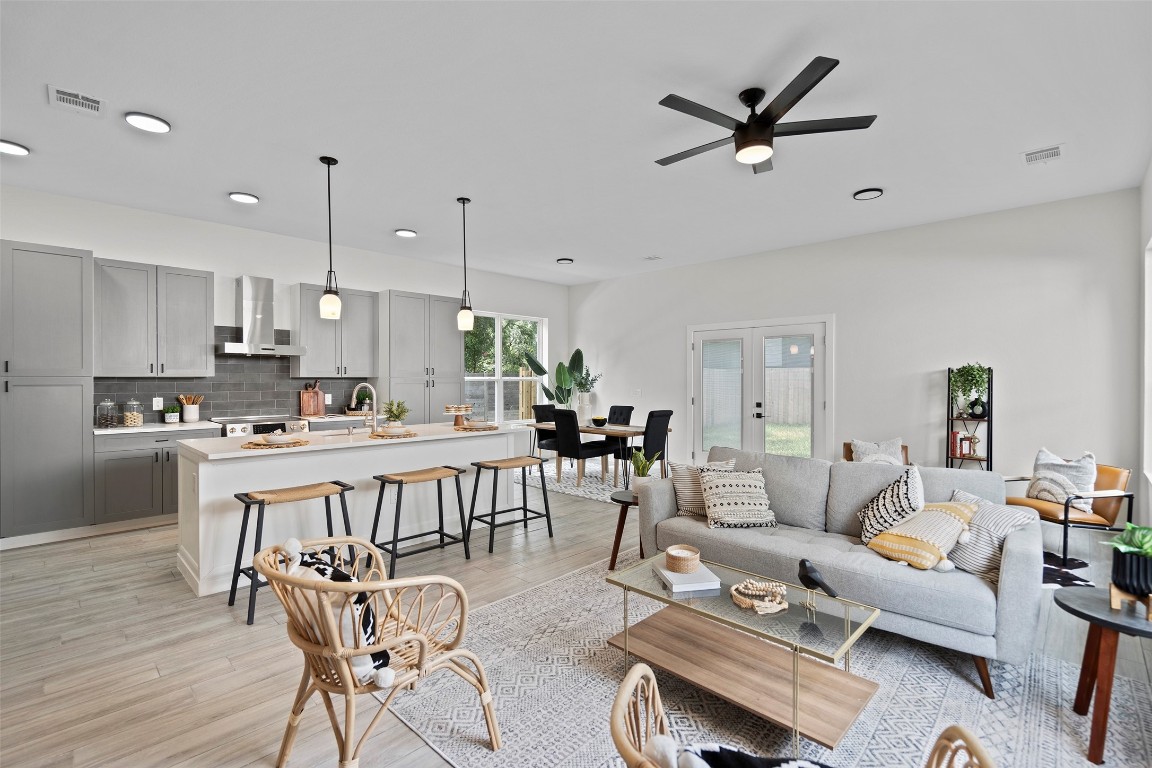 3611 Munson Street Austin, TX 78721 - Photo 23 of 40 a living room with furniture and kitchen view