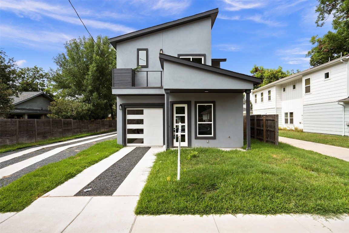 3611 Munson Street Austin, TX 78721 - Photo 3 of 40 a view of a house with a yard and sitting area