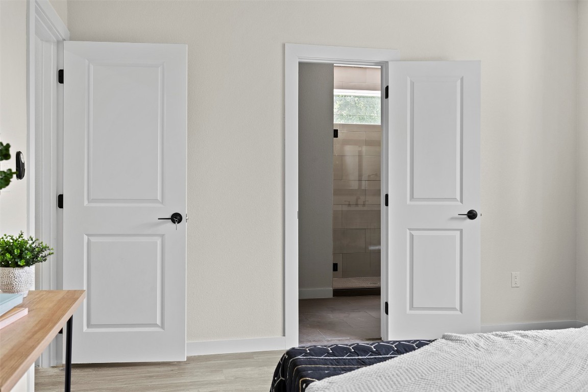 3611 Munson Street Austin, TX 78721 - Photo 31 of 40 a view of a closet area with hallway and closet