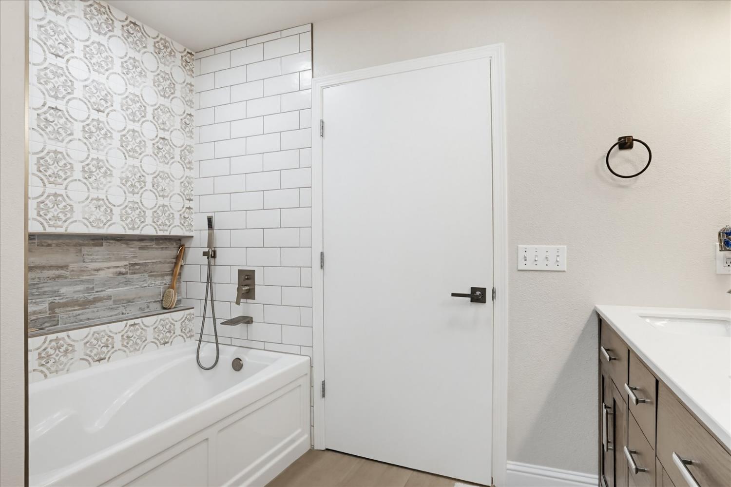 18639 Fay Ridge Court Grass Valley, CA 95949 - Photo 32 of 99 a bathroom with a tub a sink and a shower