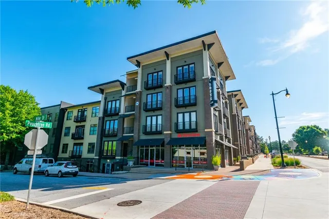 a building with sign broad in front of it
