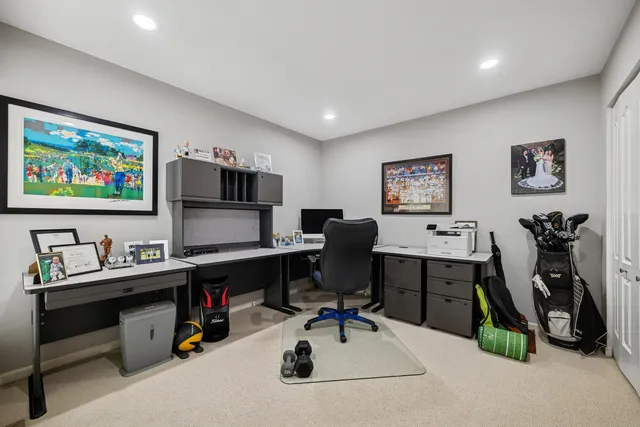 a view of a workspace with furniture