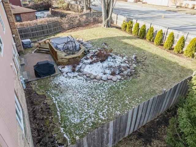 a view of a backyard with plants