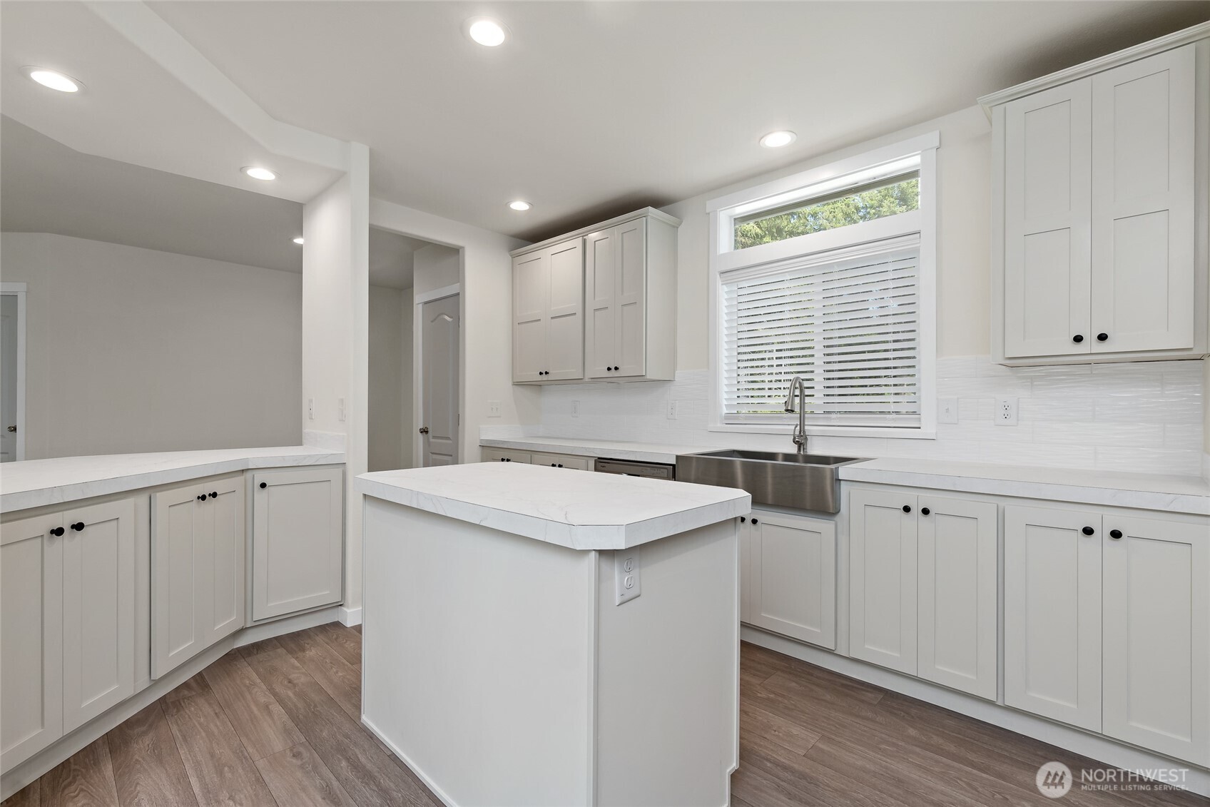 141 West Delight Park Road Shelton, WA 98584 - Photo 12 of 30 a kitchen with white cabinets sink and window