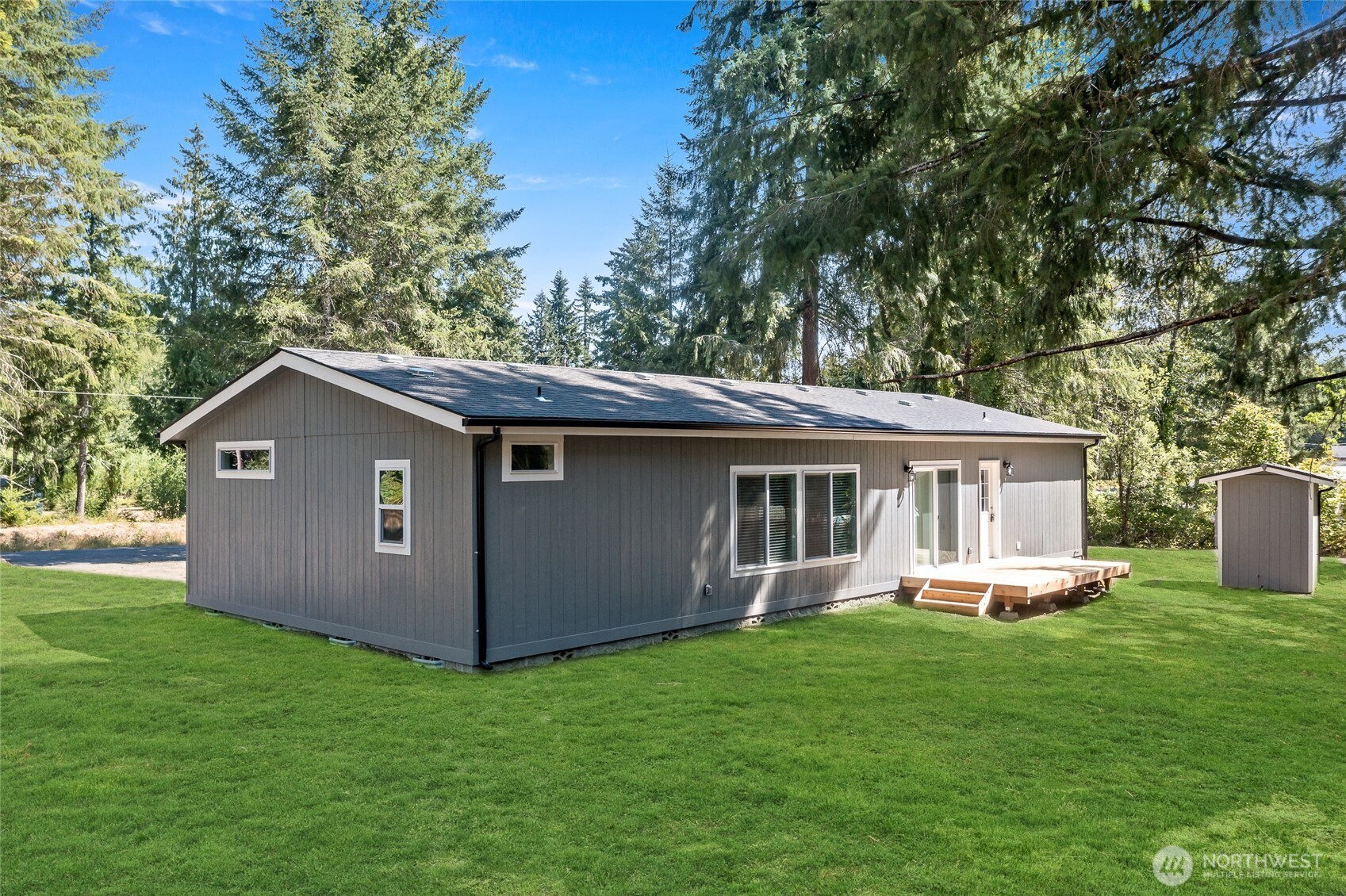 141 West Delight Park Road Shelton, WA 98584 - Photo 27 of 30 a front view of house with backyard and green space