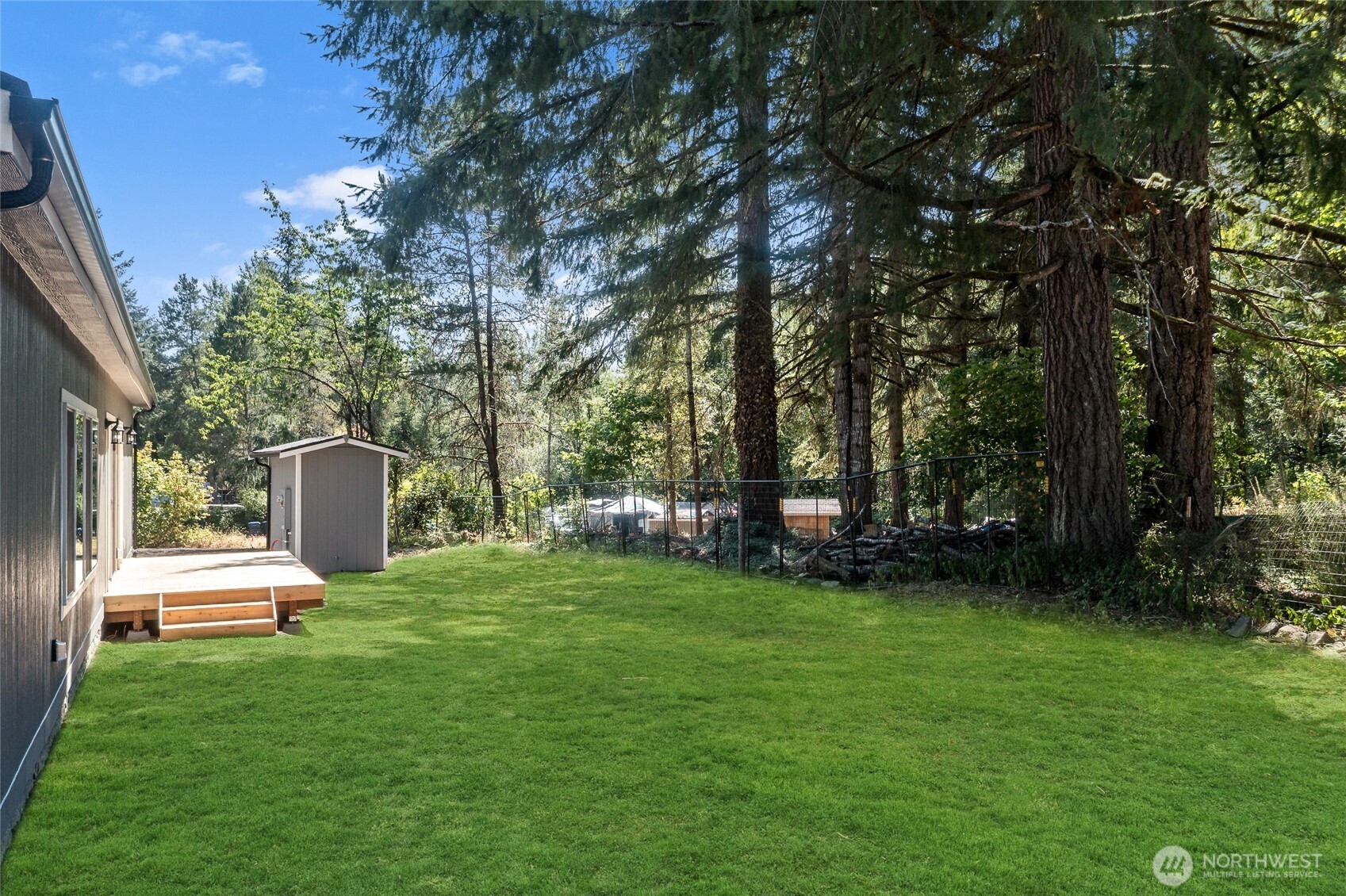 141 West Delight Park Road Shelton, WA 98584 - Photo 29 of 30 a view of a table and chairs in the garden