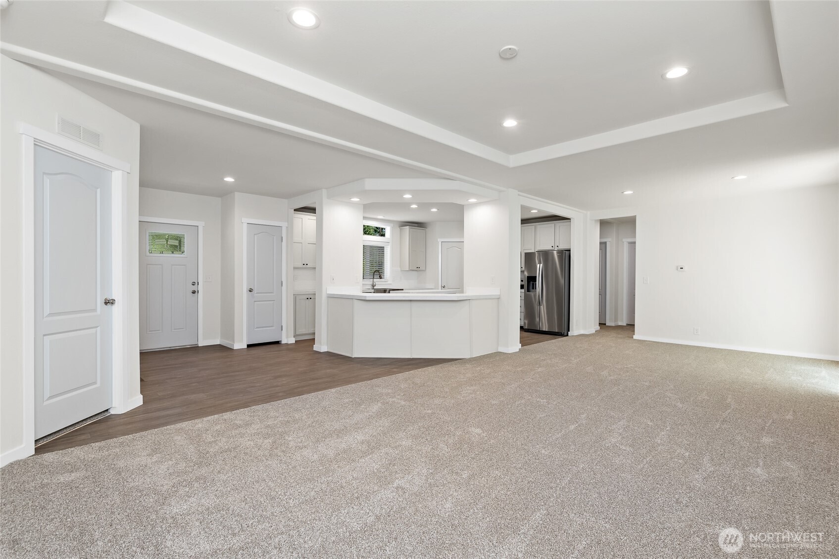 141 West Delight Park Road Shelton, WA 98584 - Photo 7 of 30 a view of a big room with refrigerator and a kitchen