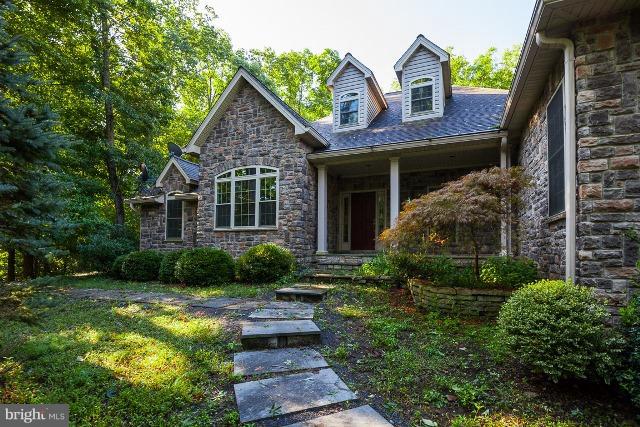 330 Morgan Road Cross Junction, VA 22625 - Photo 1 of 28 a front view of a house with garden