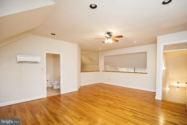 330 Morgan Road Cross Junction, VA 22625 - Photo 11 of 28 a view of a room with wooden floor and natural light