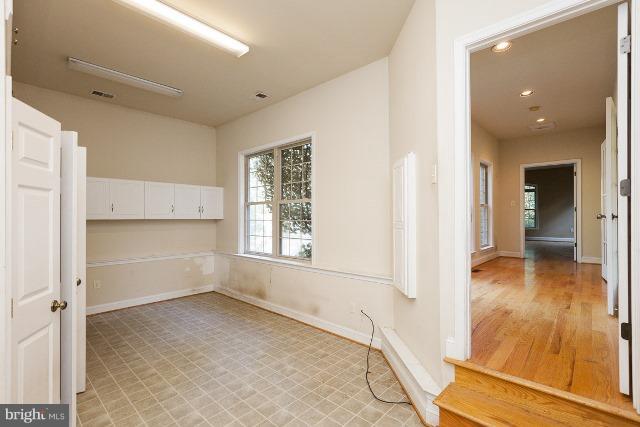 330 Morgan Road Cross Junction, VA 22625 - Photo 18 of 28 an empty room with wooden floor and windows