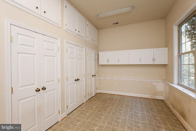 330 Morgan Road Cross Junction, VA 22625 - Photo 19 of 28 a view of a kitchen with white cabinets and window