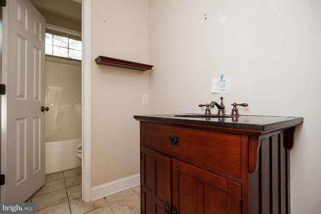 330 Morgan Road Cross Junction, VA 22625 - Photo 24 of 28 a room with a sink and a mirror