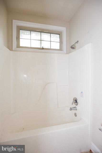 330 Morgan Road Cross Junction, VA 22625 - Photo 25 of 28 a bathroom with a bathtub and window