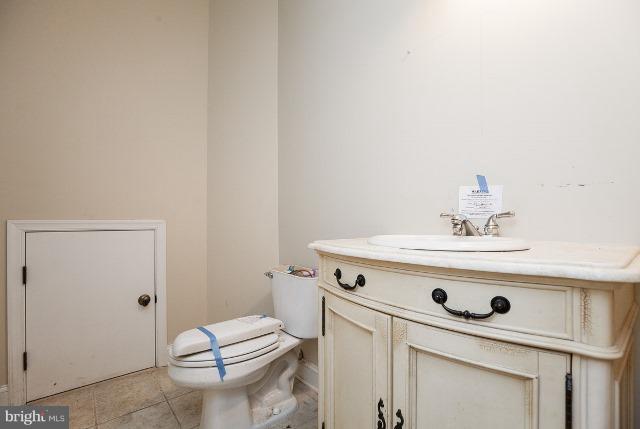 330 Morgan Road Cross Junction, VA 22625 - Photo 26 of 28 a bathroom with a sink toilet and a mirror