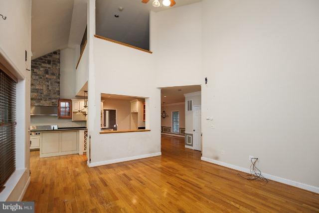 330 Morgan Road Cross Junction, VA 22625 - Photo 7 of 28 a view of a kitchen with wooden floor and a kitchen