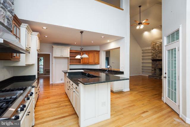 330 Morgan Road Cross Junction, VA 22625 - Photo 8 of 28 a kitchen with stainless steel appliances a sink and a stove