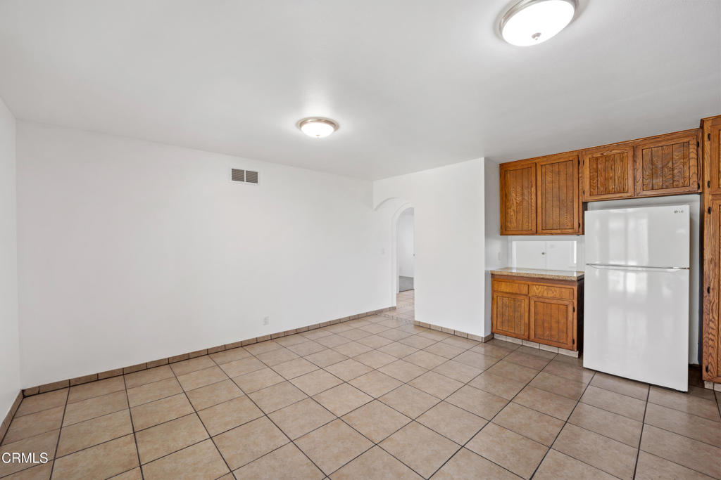 1511 Fathom Drive Oxnard, CA 93035 - Photo 12 of 29 a kitchen with a refrigerator